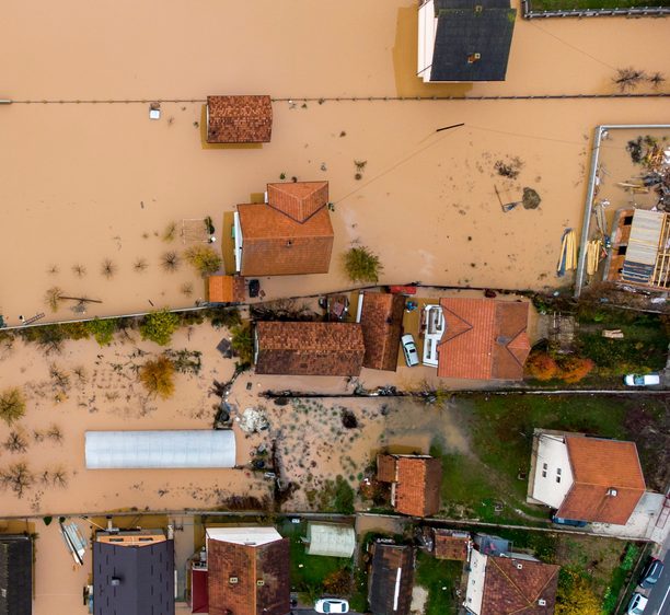 aerial view of flood affected area - climate related displacement