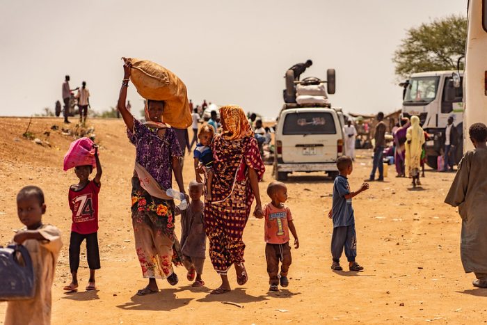 People fleeing the conflict in Sudan arrive at the reception centre in Joda, South Sudan.